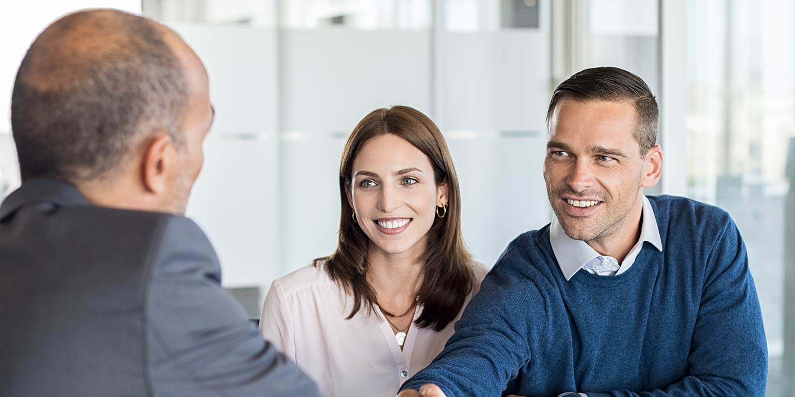 a couple meeting with a specialty life insurance broker