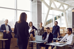 group of employees meeting together