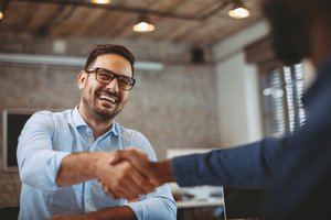 A man shaking hands with someone